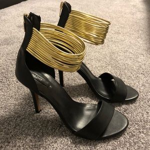 ALDO black heeled sandals with gold ankle straps